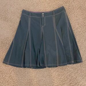 Athleta skort. Pleated & flowy, sweat wicking, worn once. Back pockets. Size 10